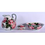 A LARGE SCOTTISH WEYMSS POTTERY WASH JUG AND BASIN together with a matching soap straining dish. Lar