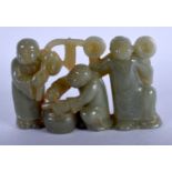 A CHINESE GREEN JADE FIGURE OF THREE BOYS 20th Century. 12 cm x 8 cm.