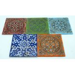 A collection of vintage ceramic tiles in an Islamic style 15 x 15cm (5).