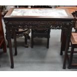 A RARE 19TH CENTURY CHINESE HARDWOOD MARBLE INSET ALTAR TABLE decorated with birds and flowering che