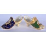 Late 19th/early 20th c. Coalport miniature ‘Dutch’ clog painted with a landscape in gilt panel on a