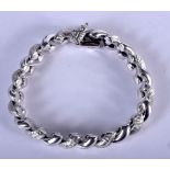 AN 14CT WHITE GOLD ITALIAN CURVING BRACELET. 24 grams. 18 cm long.