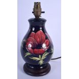 A MOORCROFT PORCELAIN LAMP. Porcelain 16.5 cm high.