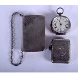AN ANTIQUE SILVER FOB WATCH together with a silver purse & silver vesta case. 177 grams overall. Lar