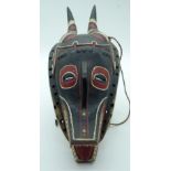 TRIBAL AFRICAN ART GURO ZAMBLE MASK from the Ivory Coast: The zamble masks combine the attributes o