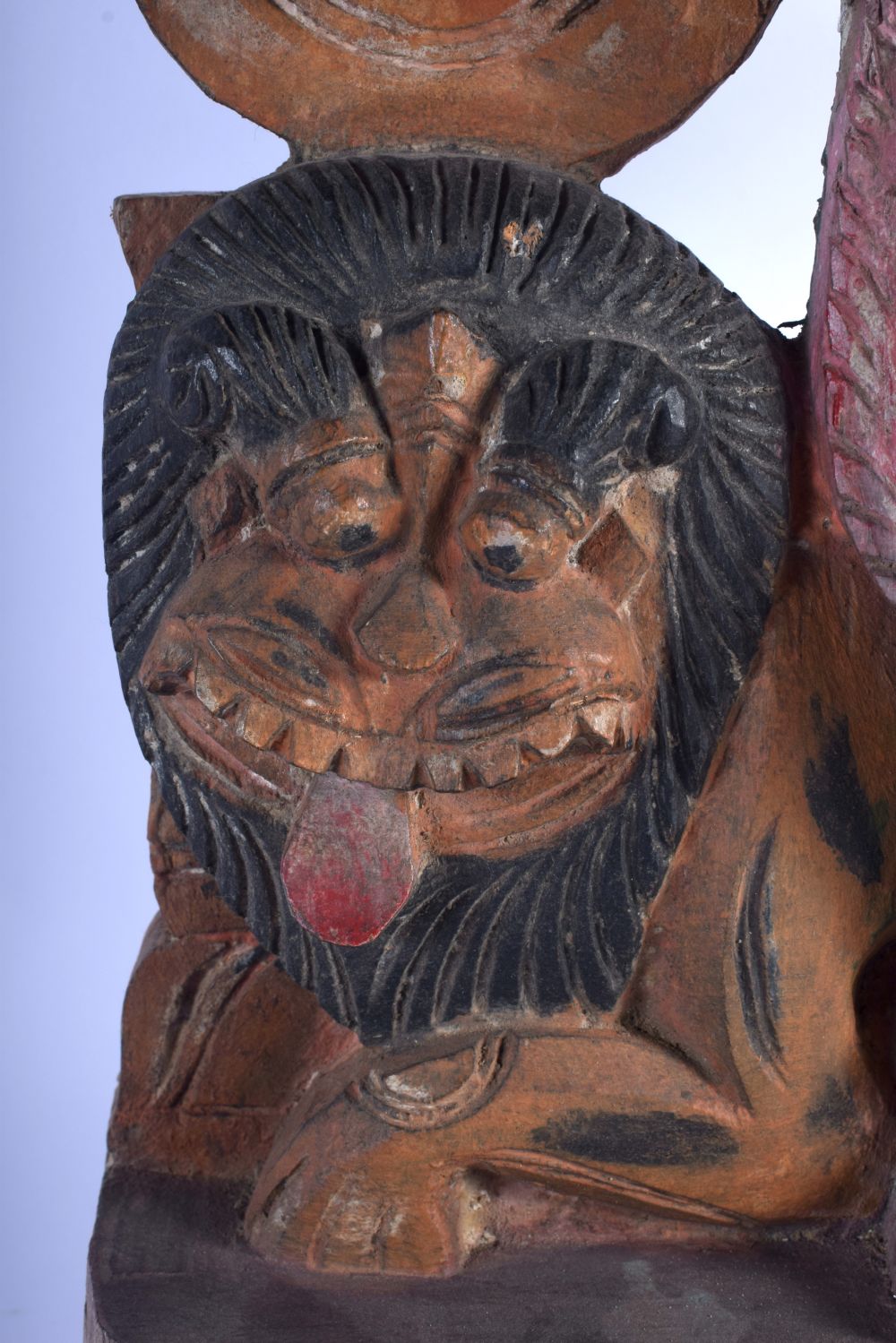 A LARGE INDIAN CARVED POLYCHROMED WOOD FIGURE OF FOUR ARMED DURGA modelled with a lion behind her. 5 - Image 3 of 5