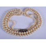 A 1920S SILVER AND PEARL NECKLACE. 76 grams. 61 cm long.