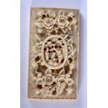 A 19TH CENTURY CHINESE CANTON CARVED IVORY CARD CASE Qing, decorated with flowers. 45 grams. 8 cm x