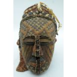 TRIBAL AFRICAN ART - KUBA NGAADY MASK. This helmet mask (ngaady a mwaash) was worn by the high-ran