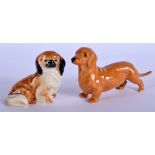 Royal Worcester figure of a dachshund and another of a Peke 3034 date code 1951 and 1935. 1cm long