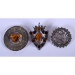 THREE VINTAGE SILVER BROOCHES. 30 grams. Largest 5 cm wide. (3)