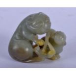 AN EARLY 20TH CENTURY CHINESE CARVED GREEN JADE FIGURE. 7 cm x 5 cm.