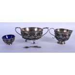 A THREE PIECE EUROPEAN WHITE METAL CONDIMENT SET. White metal 340 grams. Largest 16 cm x 7 cm.