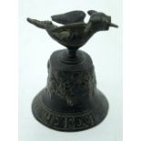 A Bronze European Table bell with a stylised bird handle inscribed with Latin text 12cm