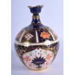 Royal Crown Derby spherical vase with short neck painted with pattern 1128 date code 1920. 15cm hig