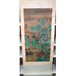 A Chinese Scroll painted with figures in a landscape 105 x 50cm.