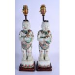 A RARE PAIR OF 18TH CENTURY CHINESE FAMILLE VERTE PORCELAIN FIGURES Qing, modelled as the Hehe Erxia