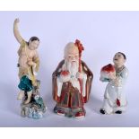 THREE 1950S CHINESE PORCELAIN FIGURES modelled in various pursuits. Largest 25 cm high. (3)