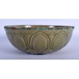 A 19TH CENTURY CHINESE CELADON GLAZED PORCELAIN BOWL Late Qing. 19 cm diameter.