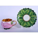 A RARE 19TH CENTURY MEISSEN PORCELAIN ARTICHOKE MOULDED CUP AND SAUCER of naturalistic form, with gi