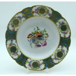 A 19TH CENTURY FRENCH SEVRES STYLE PARIS PORCELAIN SCALLOPED PLATE painted with flowers. 23 cm diame