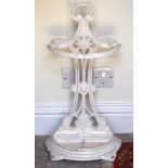 AN ARTS AND CRAFTS CAST IRON UMBRELLA STAND in the manner of Dresser. 66 cm x 27 cm.