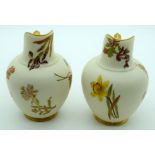 A PAIR OF ROYAL WORCESTER BLUSH IVORY FLATBACK JUGS painted with flowers. 13 cm high.