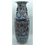 A VERY LARGE 19TH CENTURY CHINESE CANTON FAMILLE ROSE VASE Qing, painted with figures within landsca