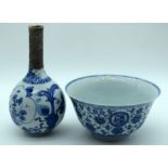 A 17TH CENTURY CHINESE BLUE AND WHITE BOTTLE NECK PORCELAIN VASE Kangxi, together with a blue and wh