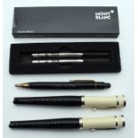 A PAIR OF MONTBLANC PENS together with two others. (4)