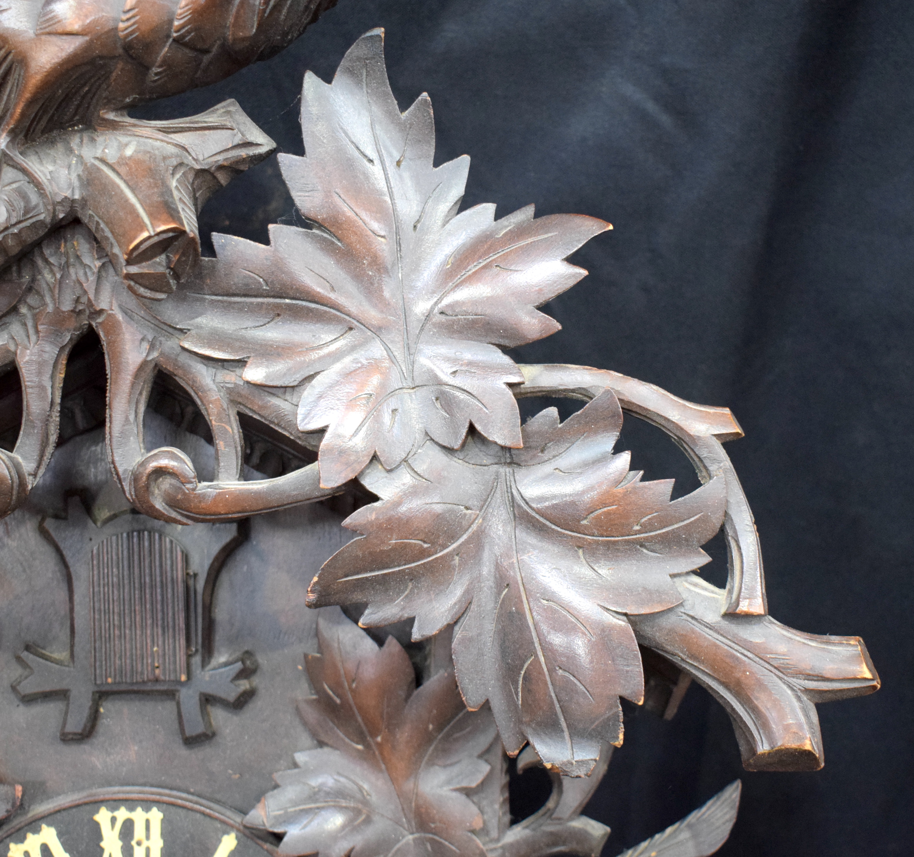 A 19TH CENTURY BAVARIAN BLACK FOREST CARVED WOOD CUCKOO CLOCK formed with opposing birds beside a ne - Image 3 of 13