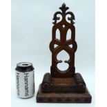 A 19TH CENTURY ENGLISH GOTHIC REVIVAL ECCLESIASTICAL CARVED WOOD DISPLAY STAND in the manner of Pugi