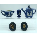 A RARE PAIR OF 19TH CENTURY WEDGWOOD BLUE BASALT PORCELAIN PLAQUES together with a pepper pot etc. (