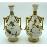 A PAIR OF 19TH CENTURY AESTHETIC MOVEMENT TWIN HANDLED PORCELAIN VASES by Franz Anton Mehlem for Roy