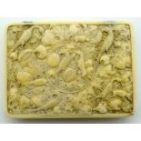 A 19TH CENTURY CONTINENTAL CARVED IVORY FOLDING CASE decorated with birds and foliage. 8.5 cm x 6.5
