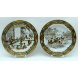 A PAIR OF 19TH CENTURY JAPANESE MEIJI PERIOD KUTANI PORCELAIN PLATES painted with figures within lan