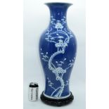 A VERY LARGE 19TH CENTURY CHINESE BLUE AND WHITE PRUNUS VASE Qing, upon a fitted base. Vase 60 cm x