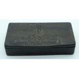A RARE 19TH CENTURY CONTINENTAL CARVED RHINOCEROS HORN SNUFF BOX carved with Christ upon the cross.