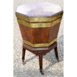 A GEORGE III MAHOGANY WINE COOLER ON STAND with brass mounts. 63 cm x 42 cm.