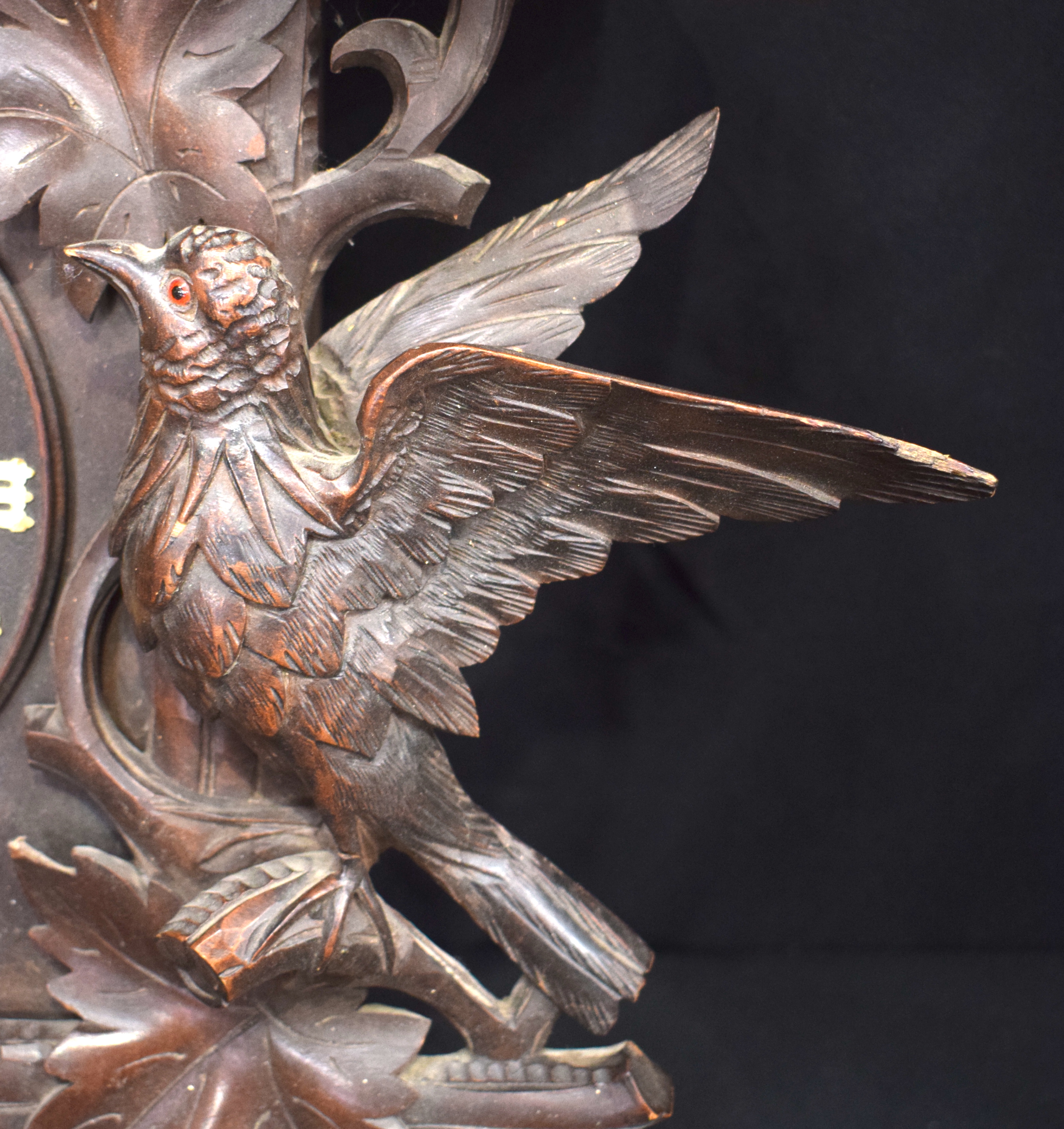 A 19TH CENTURY BAVARIAN BLACK FOREST CARVED WOOD CUCKOO CLOCK formed with opposing birds beside a ne - Image 7 of 13