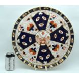 A LARGE 19TH CENTURY ENGLISH DERBY DAVENPORT IMARI CIRCULAR TRAY painted with flowers. 36 diameter.