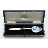 A CHARMING ART DECO SILVER AND ENAMEL SKI JUMPING SPOON. 12 grams. 11 cm long.