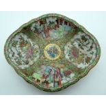A MID 19TH CENTURY CHINESE CANTON FAMILLE ROSE LOBED DISH Qing, painted with figures. 24 cm x 20 cm.