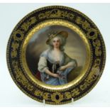 A FINE EARLY 20TH CENTURY VIENNA PORCELAIN CABINET PLATE painted with a portrait of a female. 24 cm