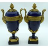 A FINE PAIR OF MID 19TH CENTURY FRENCH SEVRES PORCELAIN AND ORMOLU VASES AND COVERS decorated with m