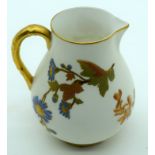 A RARE ROYAL WORCESTER BLUSH IVORY SPARROW BEAK JUG C1899 painted with flowers. 10 cm high.