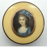 A FINE REGENCY GOLD TORTOISESHELL AND IVORY CIRCULAR BOX AND COVER inset with a miniature of a lady.