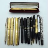 AN ART NOUVEAU TYPE SILVER OVERLAID PEN together with Watermans pens etc. (qty)