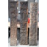 THREE AFRICAN TRIBAL YORUBA CARVED WOOD RELIEF PANELS . Largest 172 cm x 30 cm. (3)