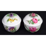 A PAIR OF ANTIQUE MEISSEN PORCELAIN BOWLS AND COVERS painted with floral sprays. 7 cm x 5 cm.